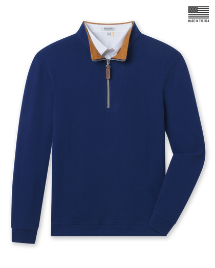 Men's Montecito Quarter Zip in New Indigo, flat lay front view featuring a solid navy long sleeve quarter zip with a gold collar interior, leather zipper pull, silver chain zipper, ribbed cuffs and hem