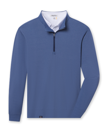 Blue buttery soft midweight quarter zip pullover layered with a white polo visible at the neckline