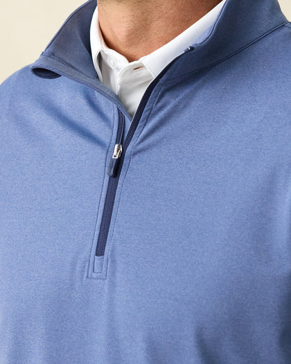 Men's Tiburon Quarter Zip in Moonlight, close-up front view on model highlighting the navy quarter zip placket and white polo collar visible at neckline