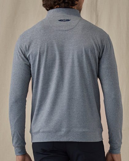 Men's Tiburon Quarter Zip in Storm, back view on model featuring a heathered gray solid fabric with Straight Down logo embroidered at the upper back, paired with black pants