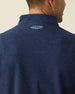 Men's Burnside 2.0 Quarter Zip in New Indigo, close-up back neck view on model highlighting the Straight Down logo embroidered at center back neck and heathered fleece texture detail