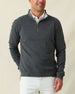 Men's Burnside 2.0 Quarter Zip in Charcoal, front view on model featuring a charcoal heather fleece with brass quarter zip and leather zip pull, paired with white pants