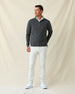 Men's Burnside 2.0 Quarter Zip in Charcoal, full length front view on model featuring a charcoal heather fleece with brass quarter zip, paired with white pants and white shoes
