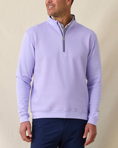 Men's Cardiff Quarter Zip in Violet, front view on model featuring a bubble knit texture with navy interior lining and silver zipper, layered over a white polo, paired with navy pants