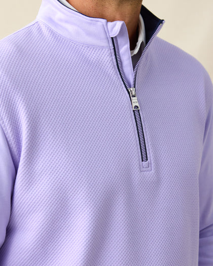 Men's Cardiff Quarter Zip in Violet, close-up front view on model highlighting the bubble knit texture, navy interior lining and silver zipper detail with white polo collar visible at neckline