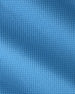 A close-up of a textured blue fabric with a fine, repeating waffle or mesh-like pattern.
