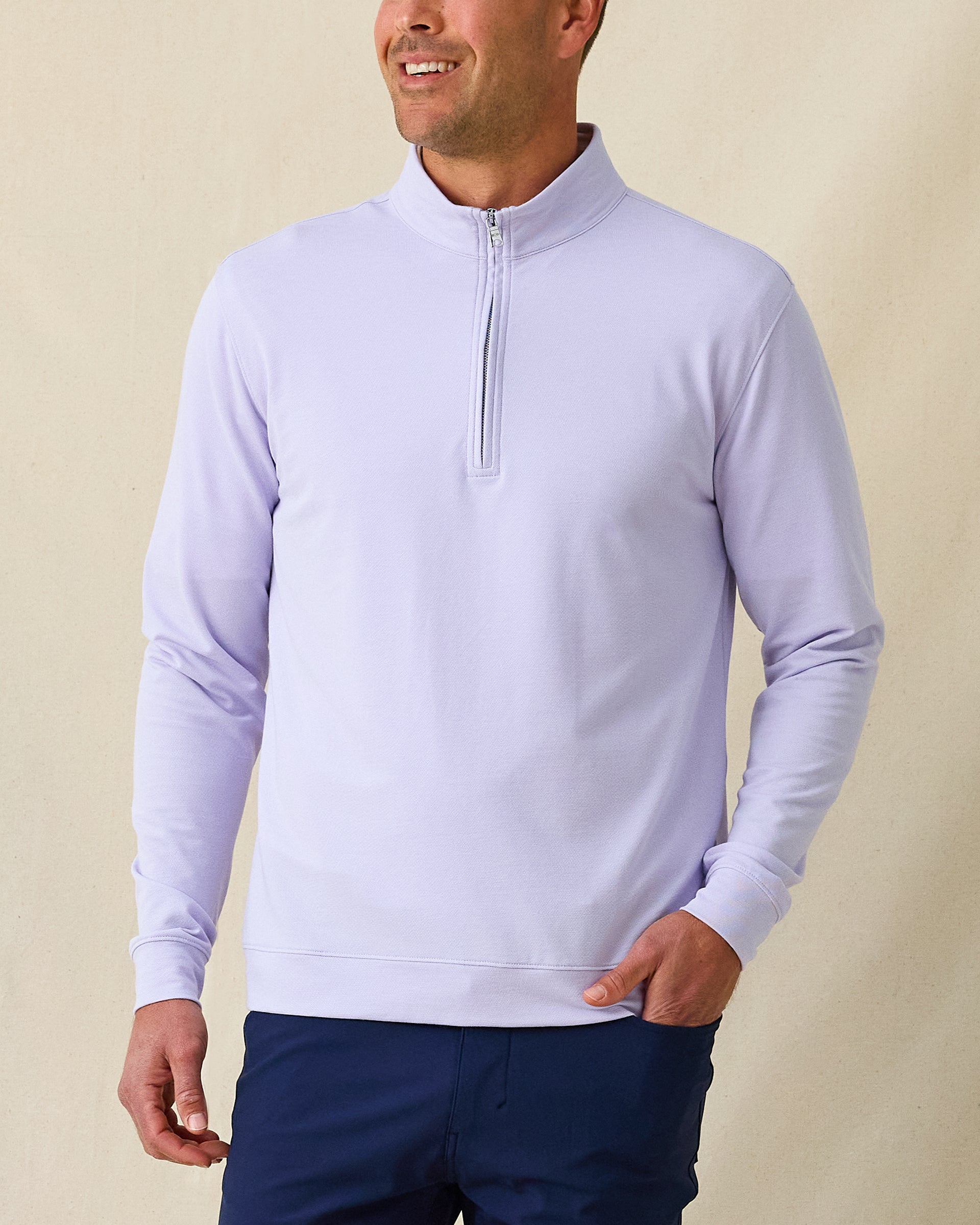 Men's Palmetto Quarter Zip in Violet, front view on model featuring a tonal quarter zip placket, paired with navy pants
