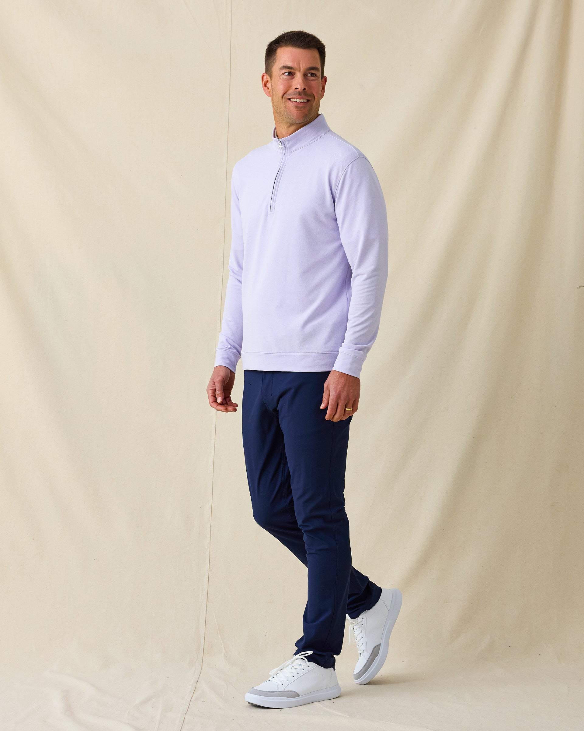 Men's Palmetto Quarter Zip in Violet, full length front view on model featuring a tonal quarter zip placket, paired with navy pants and white shoes