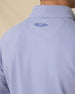 Close-up of the textured mini-grid fabric and embroidered Straight Down logo below the back collar.