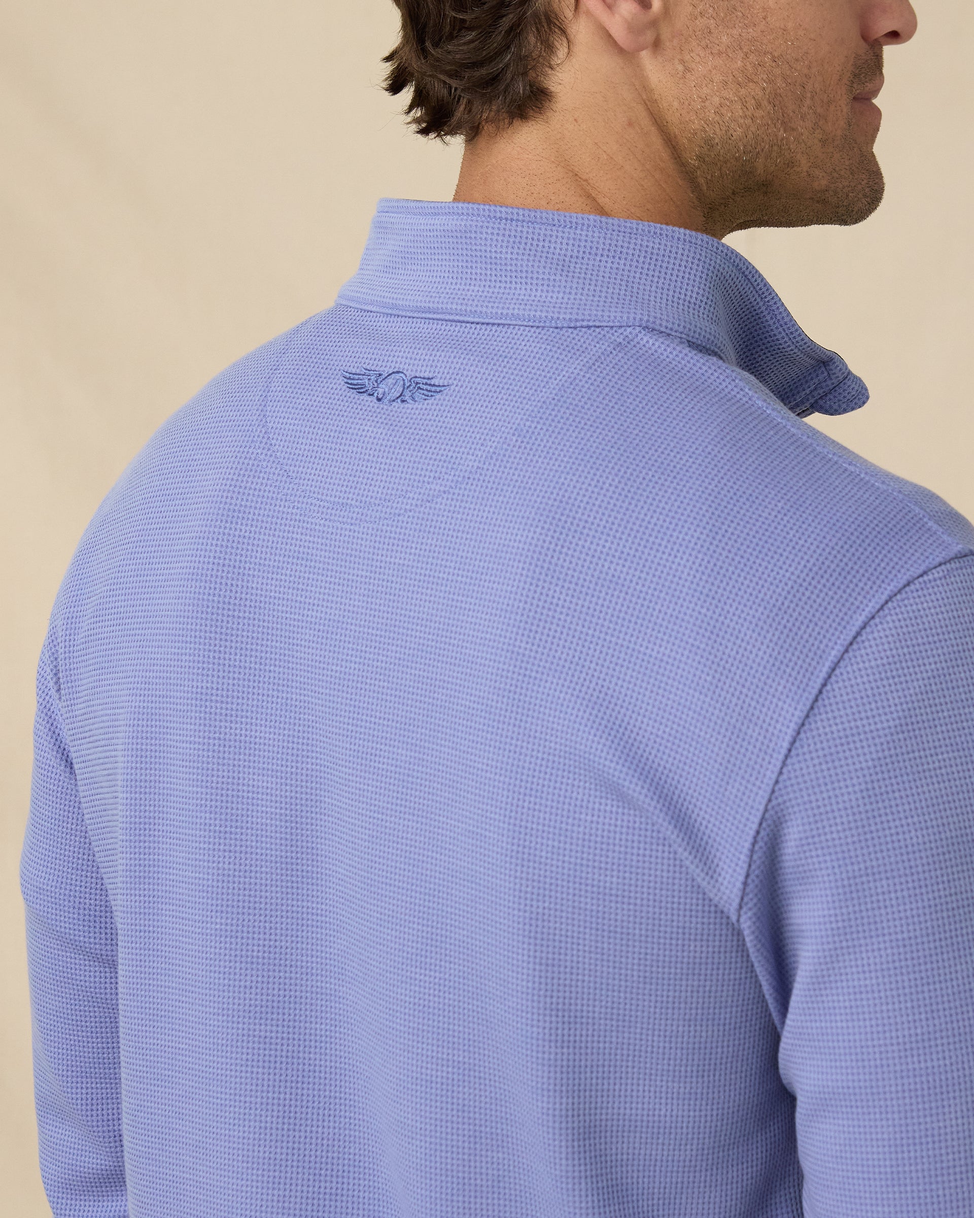 Men's Warren Quarter Zip in Tidal, back view with embroidered logo detail
