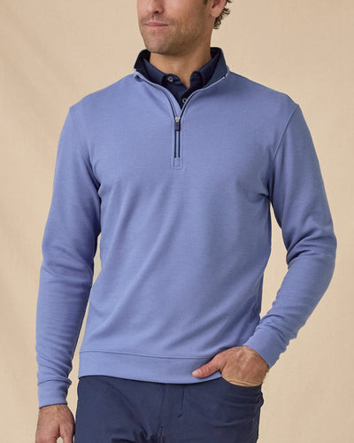 en's Warren Quarter Zip in Tidal blue, front model view with waffle texture and quarter zip detail