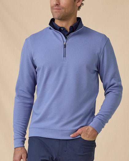 en's Warren Quarter Zip in Tidal blue, front model view with waffle texture and quarter zip detail