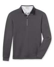 Warren Quarter Zip in Black featuring a textured mini-grid knit, stand collar, quarter-zip closure, banded hem, and sleeve cuffs.