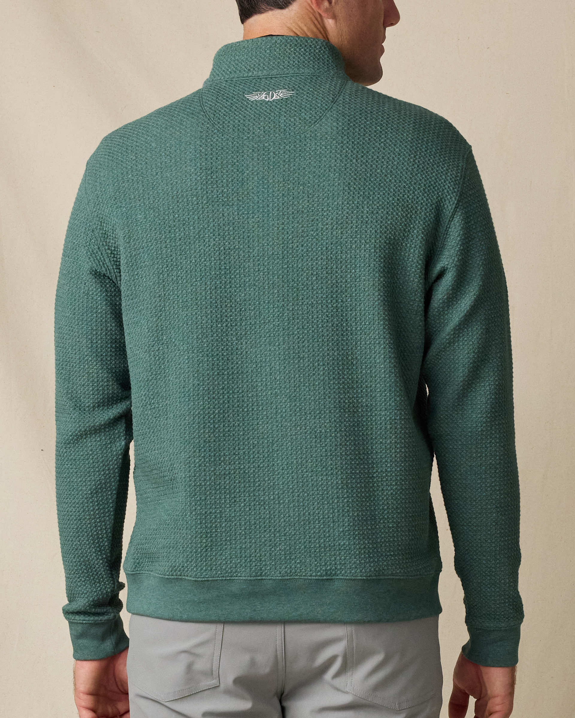 Back view of the Topanga Quarter Zip in Dark Forest, highlighting the textured construction and embroidered Straight Down logo at the collar.