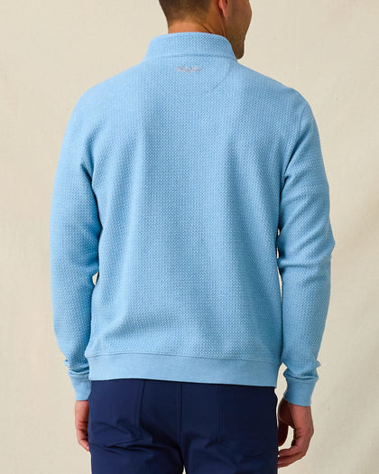 Men's Topanga Quarter Zip in Coastal, back model view featuring a medium blue long sleeve quarter zip pullover with an allover raised diamond textured fabric, with an embroidered Straight Down logo at the back collar