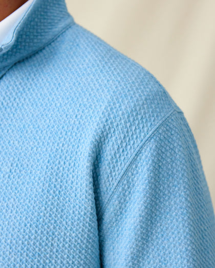 Men's Topanga Quarter Zip in Coastal, shoulder detail view featuring the medium blue allover raised diamond textured fabric construction