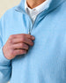 Men's Topanga Quarter Zip in Coastal, zip detail view featuring a medium blue raised diamond textured fabric with silver zip hardware, layered over a white polo