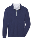 Front product view of the Palmer Quarter Zip in New Indigo, featuring a heathered blue finish, stand collar, and contrast quarter-zip placket.
