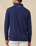 Back view of a male model wearing the Palmer Quarter Zip in New Indigo, showing the clean silhouette and embroidered logo below the collar.