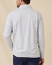 Back view of model wearing the Palmer Quarter Zip in Heather, showing the clean back design and embroidered logo below the collar.