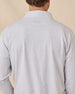 Close-up back view of the Palmer Quarter Zip in Heather showing the collar, curved seam detail, and embroidered logo.