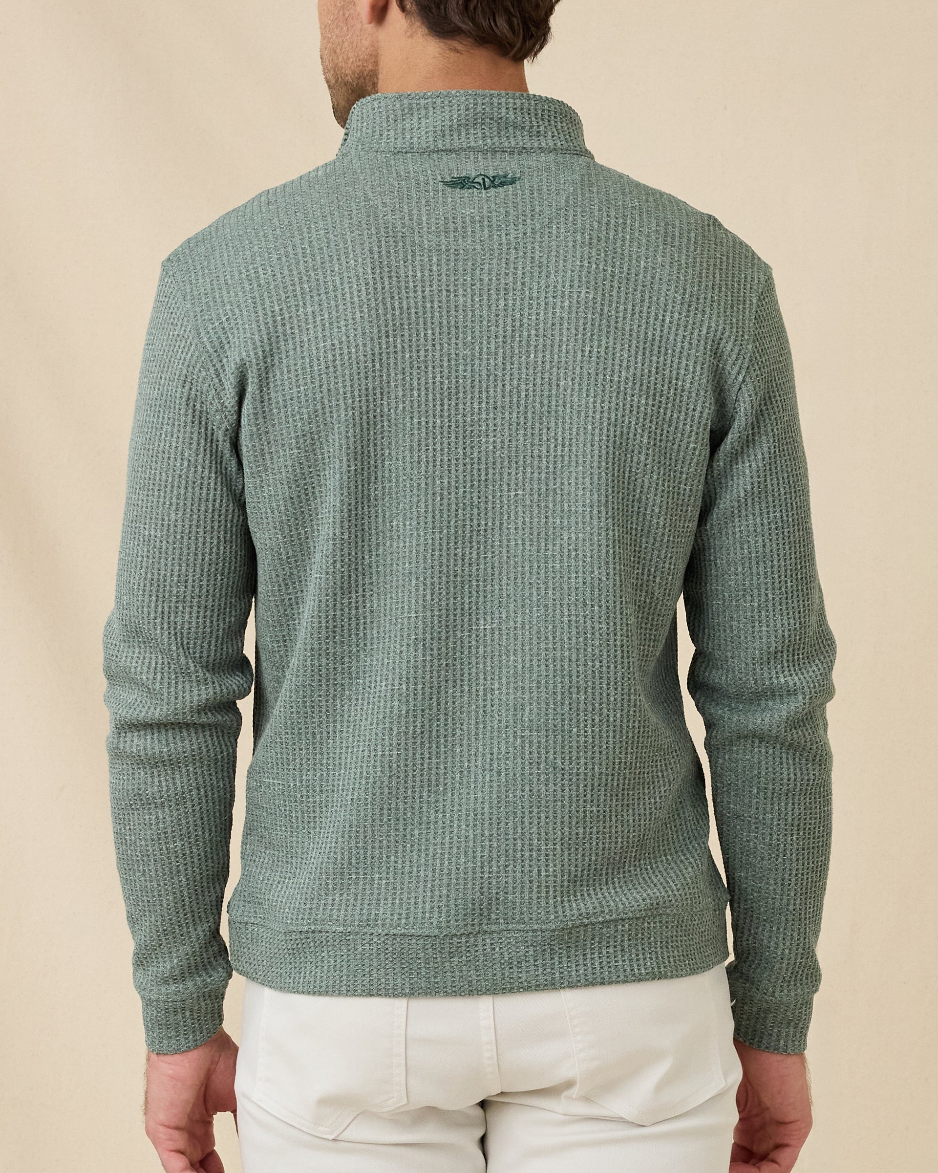 Rear view of the Dark Forest Huntington Quarter Zip, showing the waffle-knit texture and embroidered logo below the back collar.