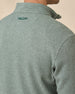 Close-up of the back collar and shoulder, highlighting the waffle-knit texture and tonal embroidered logo.