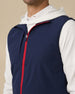 Zephyr Hybrid Vest in New Indigo / Flag Red with contrast zipper detail