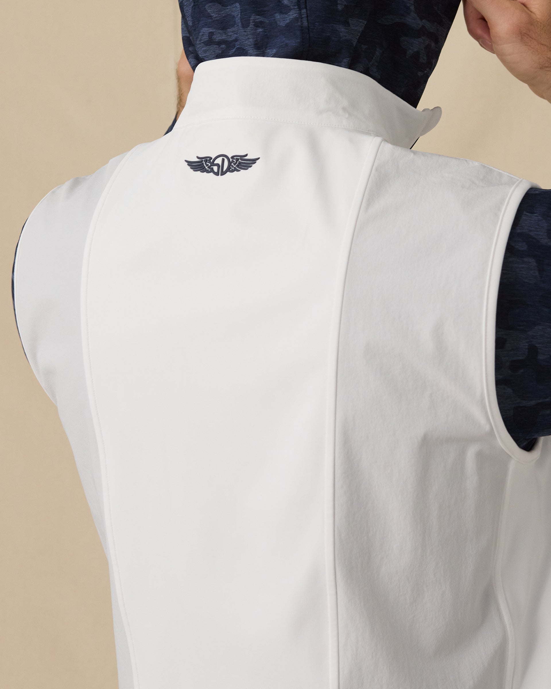 Zephyr Hybrid Vest in White / New Indigo with back logo detail