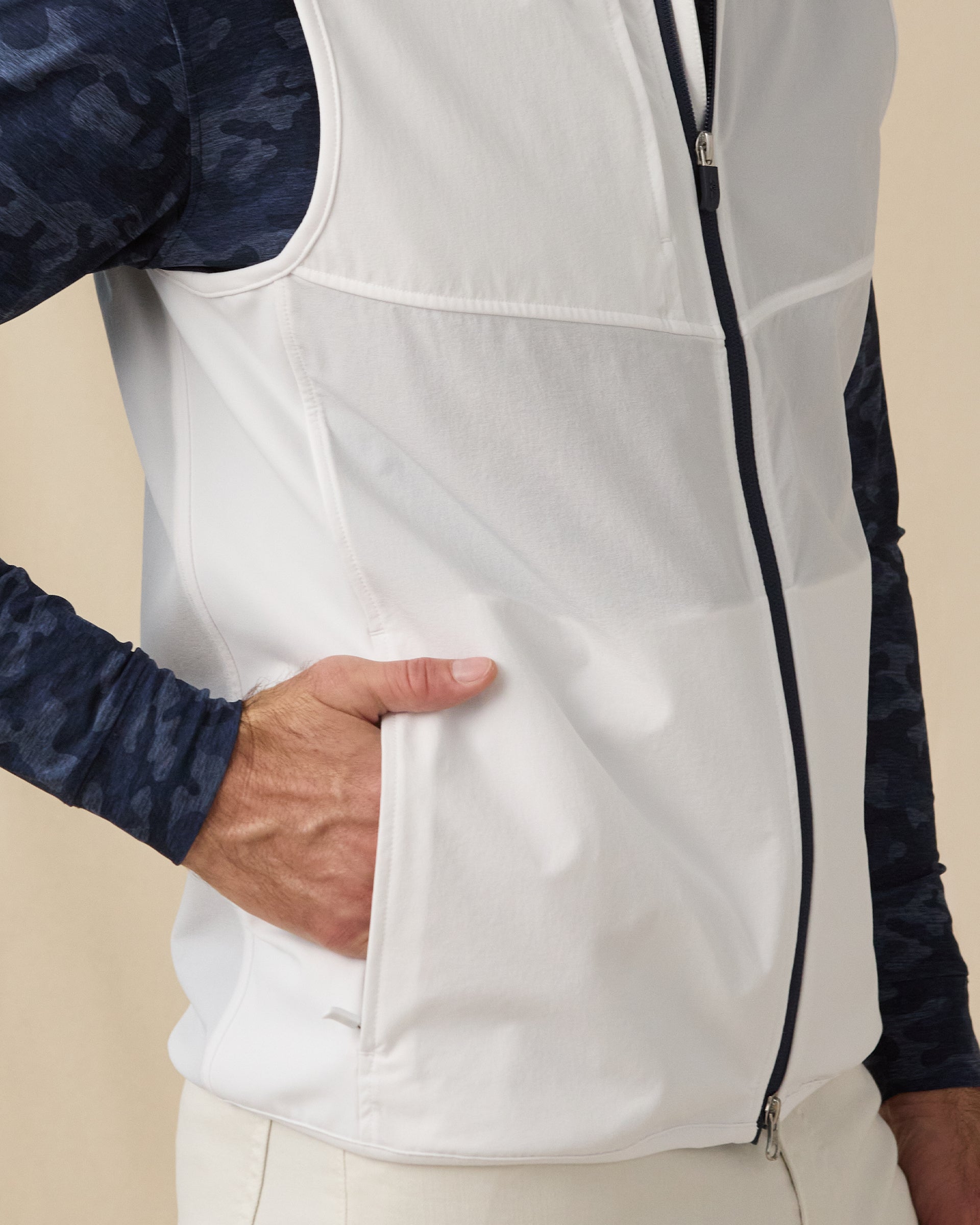 Zephyr Hybrid Vest in White / New Indigo with zip pocket detail