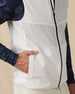 Zephyr Hybrid Vest in White / New Indigo with zip pocket detail