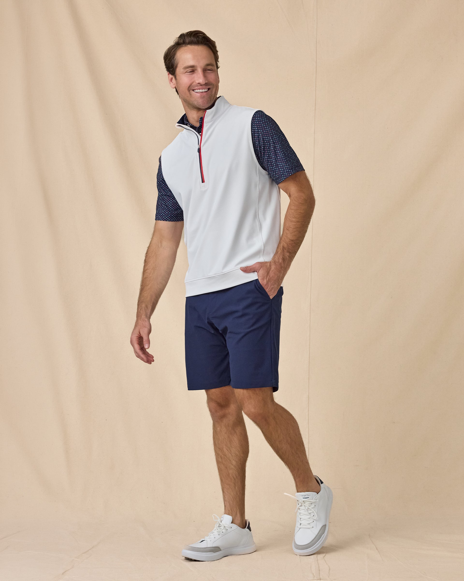 Men’s Carson Vest in White / New Indigo / Flag Red, styled full outfit view with navy shorts