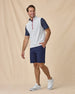Men’s Carson Vest in White / New Indigo / Flag Red, styled full outfit view with navy shorts