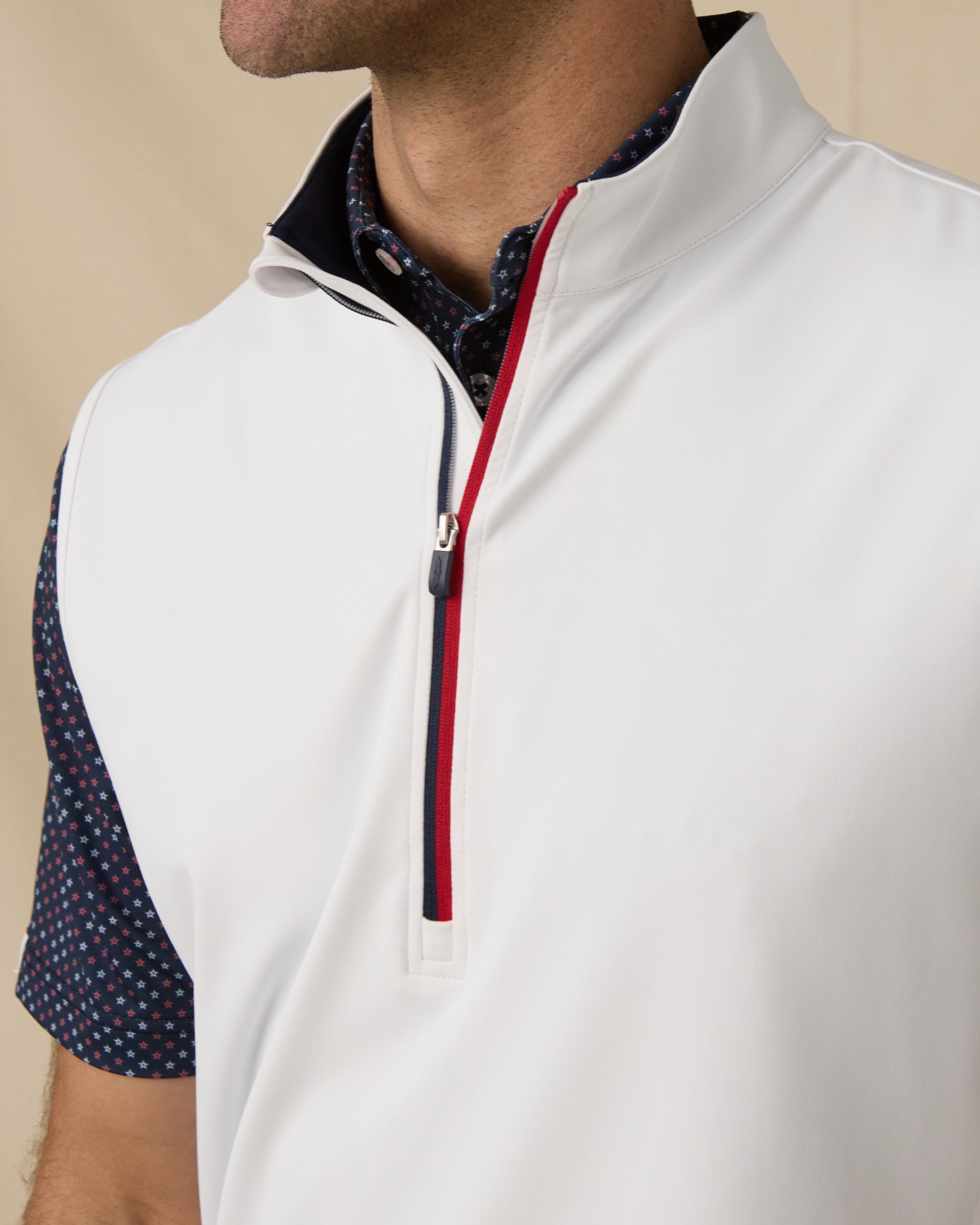 Carson Vest in White / New Indigo / Flag Red with contrast zipper and collar detail