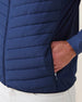 Men's Delta 2.0 Quilted Hybrid Vest in New Indigo, close-up detail view of the zip hand pocket