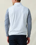 Men's Delta 2.0 Quilted Hybrid Vest in Silver, back view on model featuring the Straight Down logo at the upper back, layered over a gray long sleeve shirt, paired with navy pants