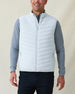 Men's Delta 2.0 Quilted Hybrid Vest in Silver, front view on model featuring a light silver quilted front panel with full zip closure, layered over a gray long sleeve shirt, paired with navy pants
