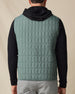 Back view of the Big Horn Vest in Dark Forest, highlighting the lightweight grid-quilted construction and clean finish.