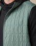 Close-up of the Big Horn Quilted Vest in Dark Forest, featuring lightweight grid quilting, a full-zip front, and stand collar.