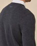 Close-up of the back of the Dark Grey Heather Connery V-Neck Sweater showing the tonal embroidered logo below the collar.