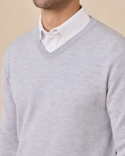 Close-up of the Light Grey Connery V-Neck Sweater showing the fine knit texture and ribbed V-neck over a white collared shirt.