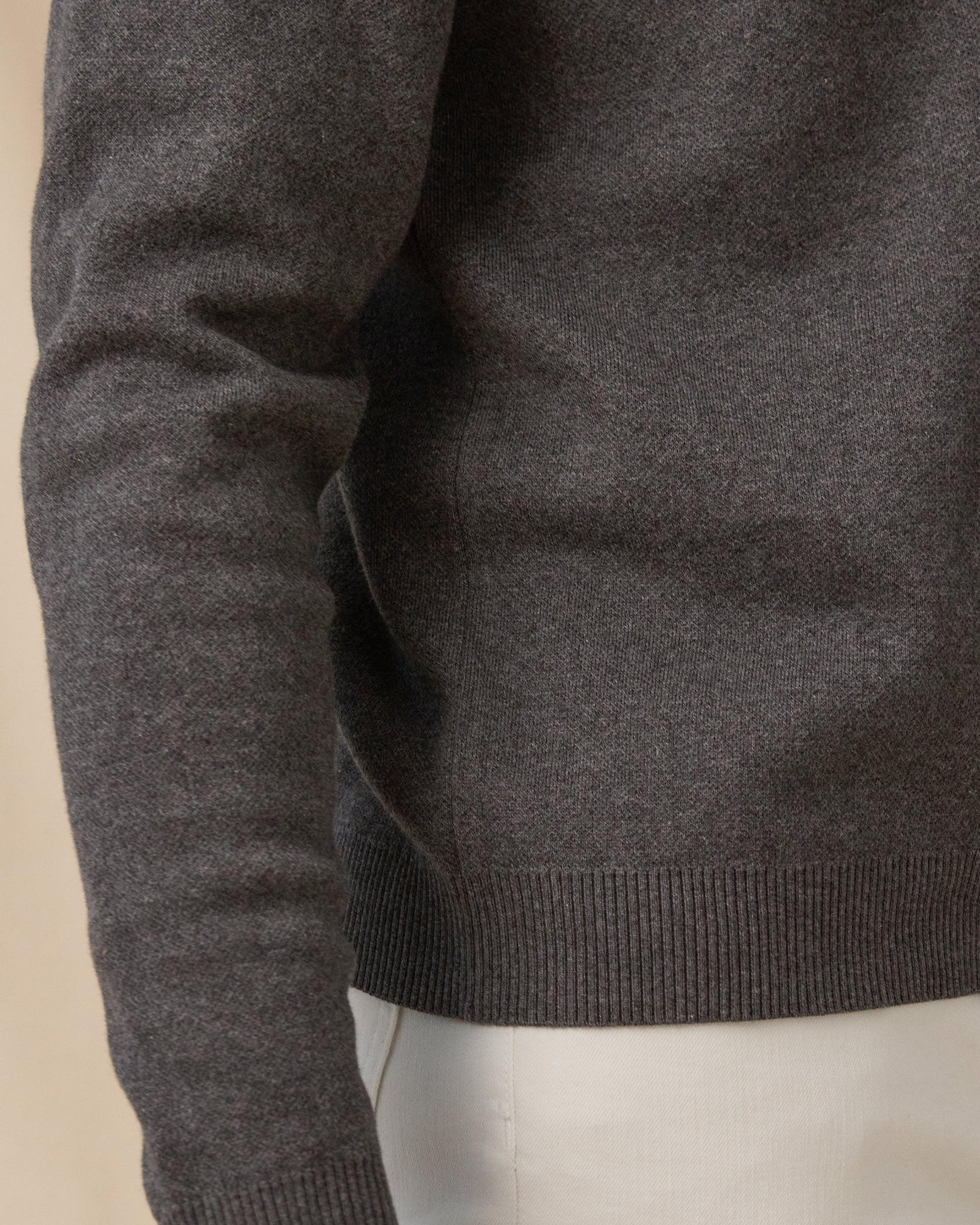 Wallace V-Neck Sweater in Dark Grey Heather with ribbed hem and cuff detail view