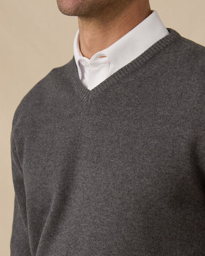 Wallace V-Neck Sweater in Dark Grey Heather layered over white button-down, v-neck detail view