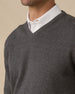 Wallace V-Neck Sweater in Dark Grey Heather layered over white button-down, v-neck detail view