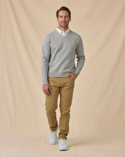 Wallace V-Neck Sweater in Light Grey Heather with khaki pants, full outfit view layered over white polo and styled with khaki pants