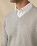Wallace V-Neck Sweater in Light Grey Heather layered over white polo, v-neck detail view