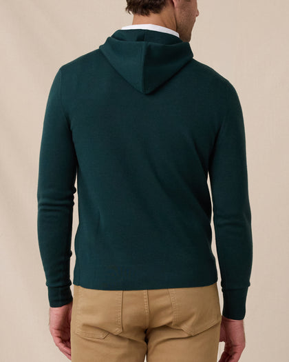 Back view of the Crenshaw Reversible Sweater Hoodie in Dark Forest showing the hood, clean silhouette, and ribbed hem and cuffs.