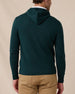 Back view of the Crenshaw Reversible Sweater Hoodie in Dark Forest showing the hood, clean silhouette, and ribbed hem and cuffs.
