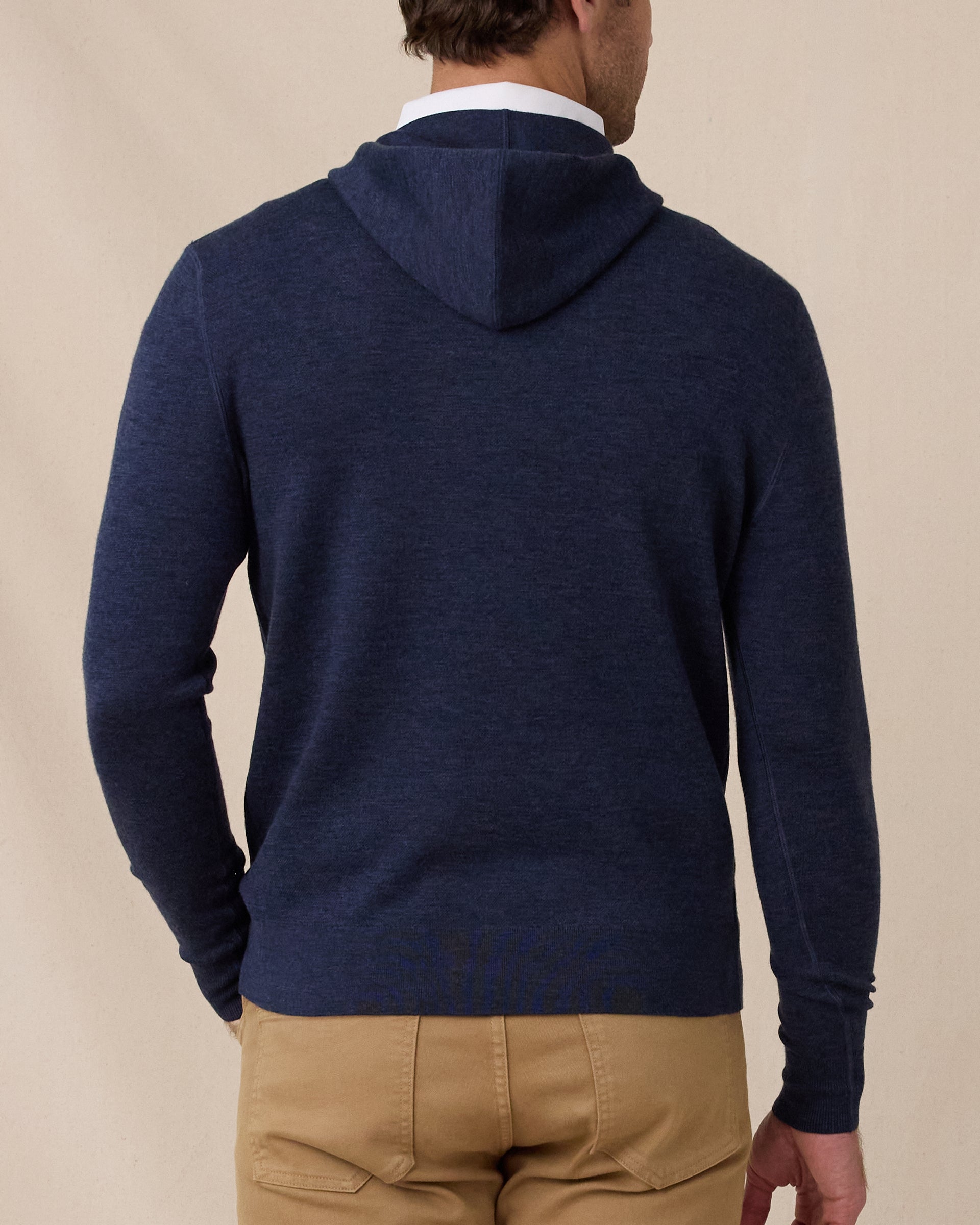 Back view of the Crenshaw Reversible Sweater Hoodie in New Indigo showcasing the streamlined fit and hood construction