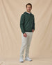 Hickam Reversible Sweater Hoodie in Dark Forest with white pants, full outfit view styled with light pants